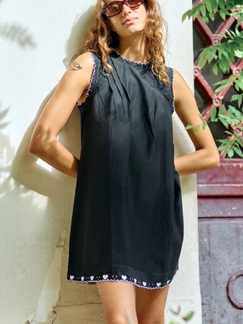 Ciao Lucia Ebba Black Sleeveless Mini Dress with Heart Trim